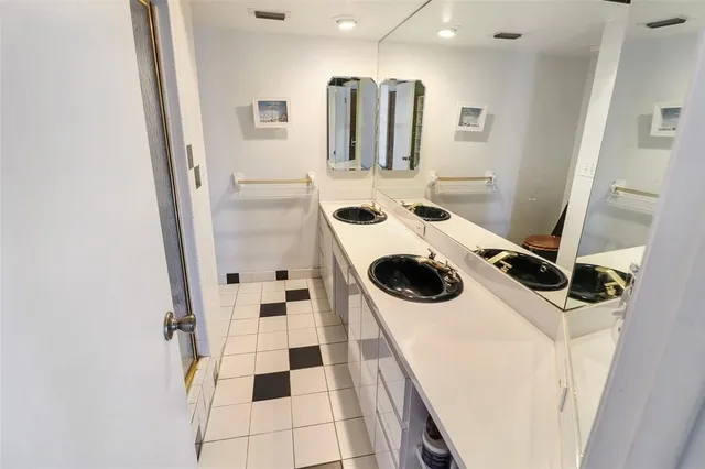 a bed room with a bed and a window