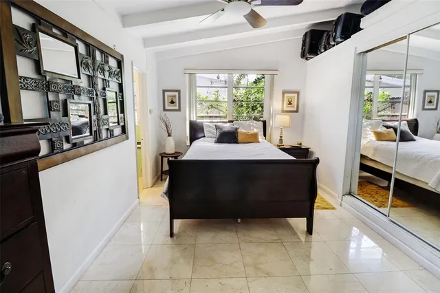 a living room with furniture and flat screen tv