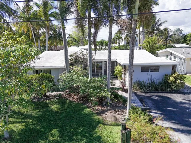 a view of a pathway both side of yard
