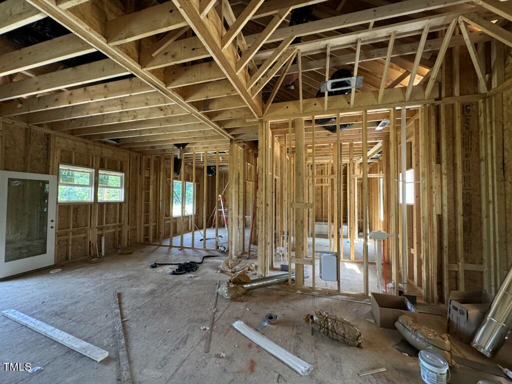 9658 Stallings Road Spring Hope, NC 27882 - Photo 3 of 20 a view of a room with gym equipment and floor to ceiling window