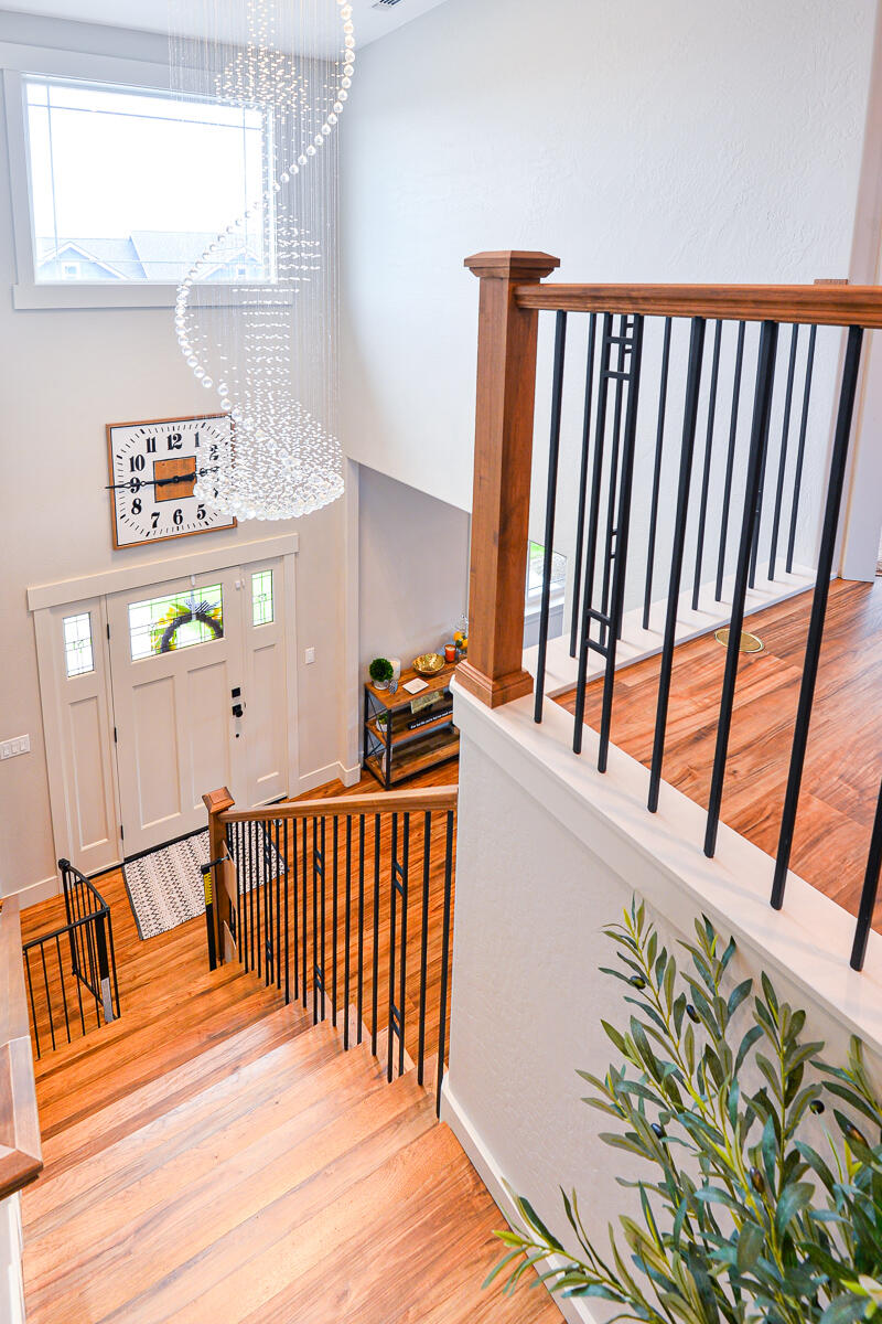 1029 Brandon Way Phoenix, OR 97535 - Photo 18 of 75 a view of a hallway with dining room and stairs