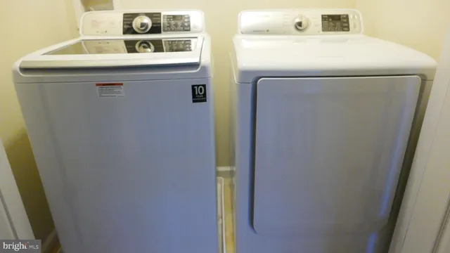 a view of a room with a ceiling fan
