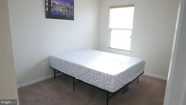 a bathroom with a toilet a sink and shower