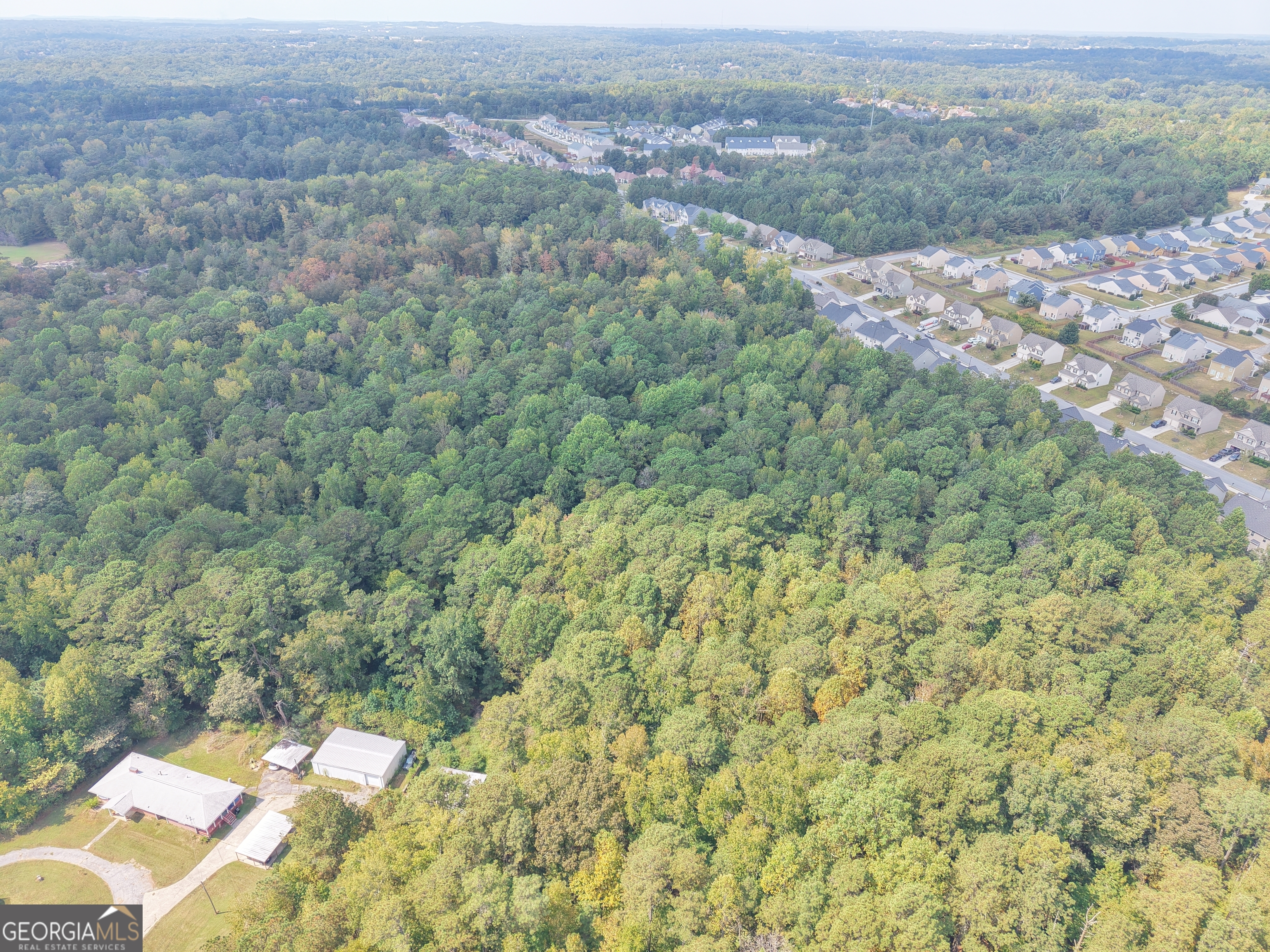 0 Bomar Road Douglasville, GA 30135 - Photo 5 of 13 a view of a field with trees in the background