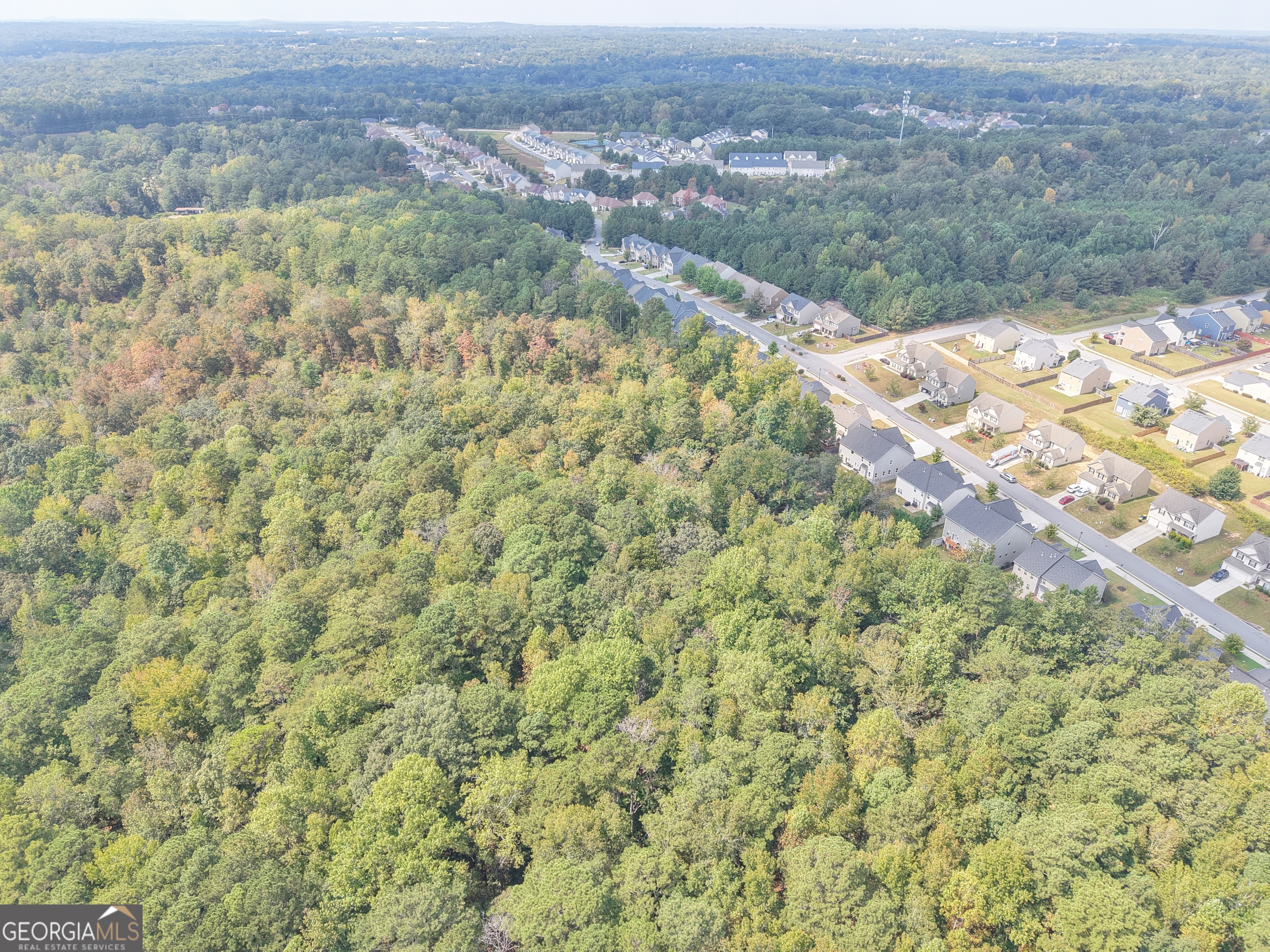 0 Bomar Road Douglasville, GA 30135 - Photo 8 of 13 a view of a forest with a mountain and trees in the background