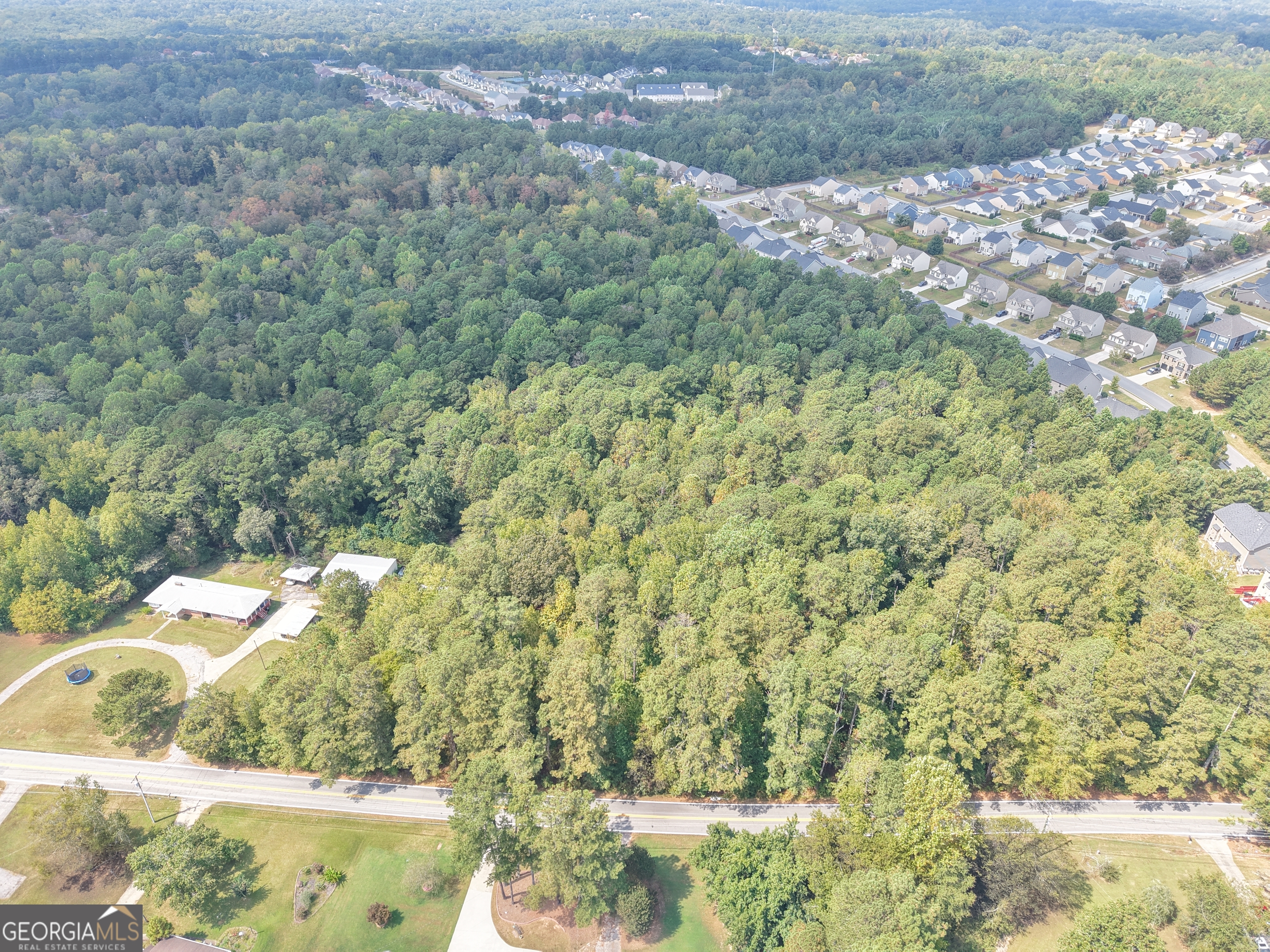 0 Bomar Road Douglasville, GA 30135 - Photo 9 of 13 a view of a yard with wooden fence