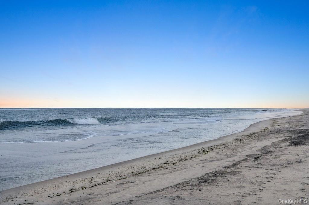 281 Dune Road, Unit 2A Westhampton Beach, NY 11978 - Photo 14 of 19 a view of beach and ocean