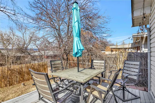 a view of a yard covered with snow in the background