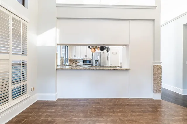 a view of a cabinet with wooden floor