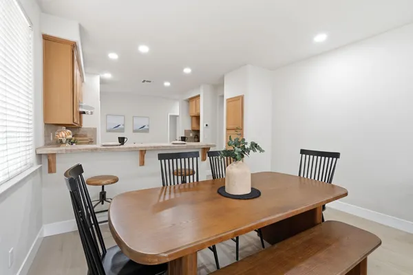 a view of a dining room with furniture