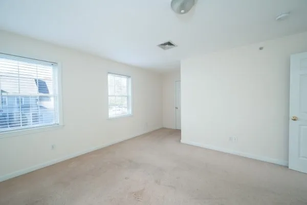 an empty room with windows