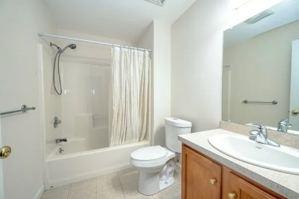 a bathroom with a sink a toilet and a bathtub
