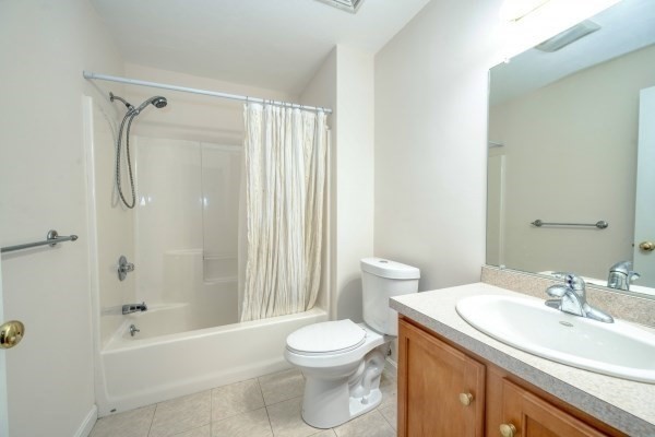 117 Tamarack Lane, Unit 117 Abington, MA 02351 - Photo 20 of 26 a bathroom with a sink a toilet and a bathtub