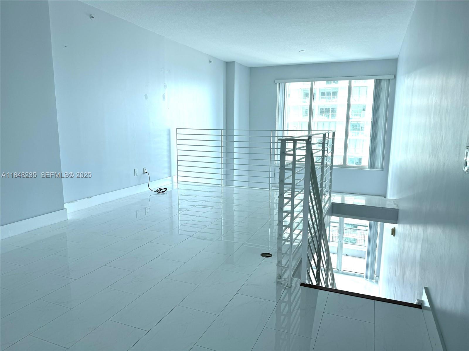 60 Southwest 13th Street, Unit 3408 Miami, FL 33130 - Photo 12 of 27 a view of entryway with a window