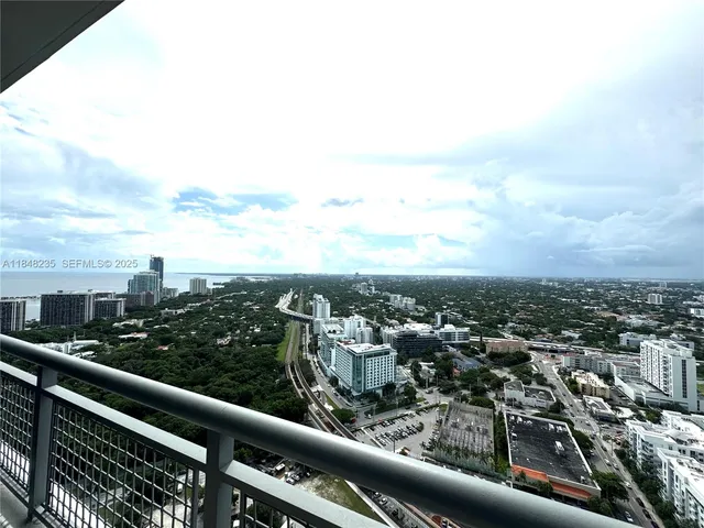 a view of a city from a balcony
