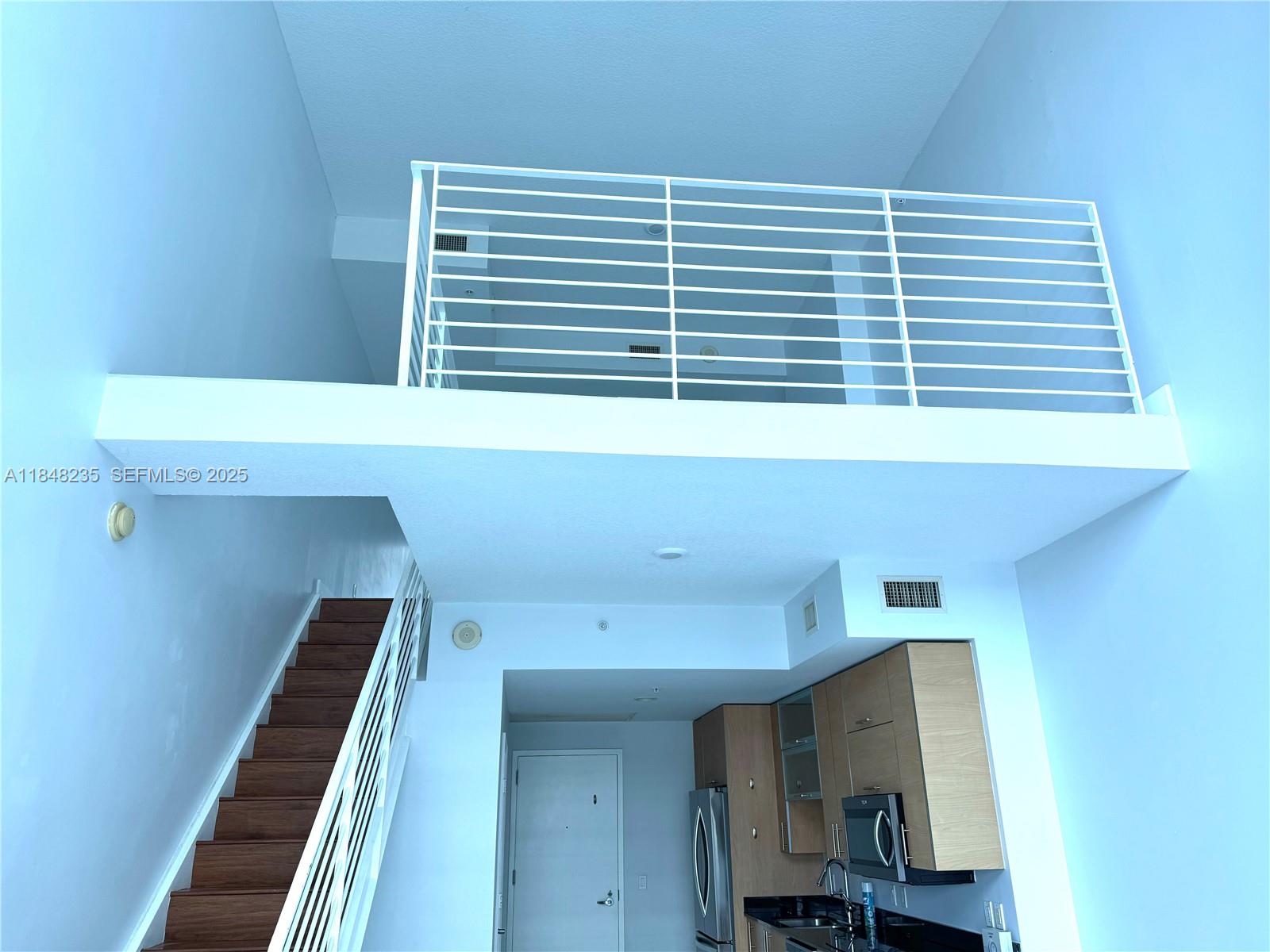 60 Southwest 13th Street, Unit 3408 Miami, FL 33130 - Photo 8 of 27 a view of kitchen and utility room