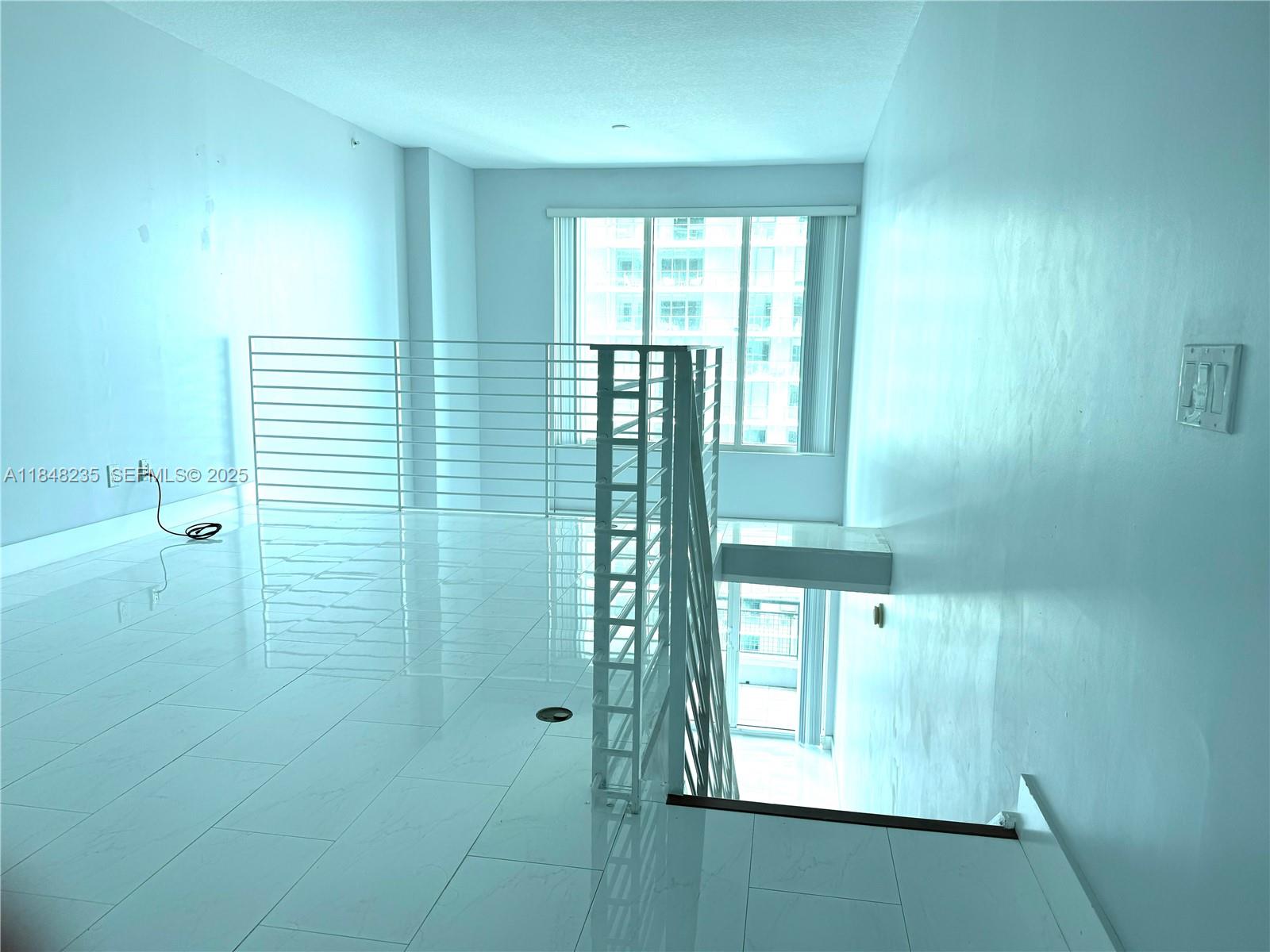 60 Southwest 13th Street, Unit 3408 Miami, FL 33130 - Photo 9 of 27 a view of an entryway of a house