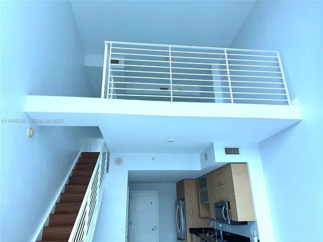 a view of kitchen and utility room