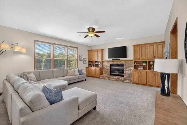 a kitchen with stainless steel appliances granite countertop a sink and a stove
