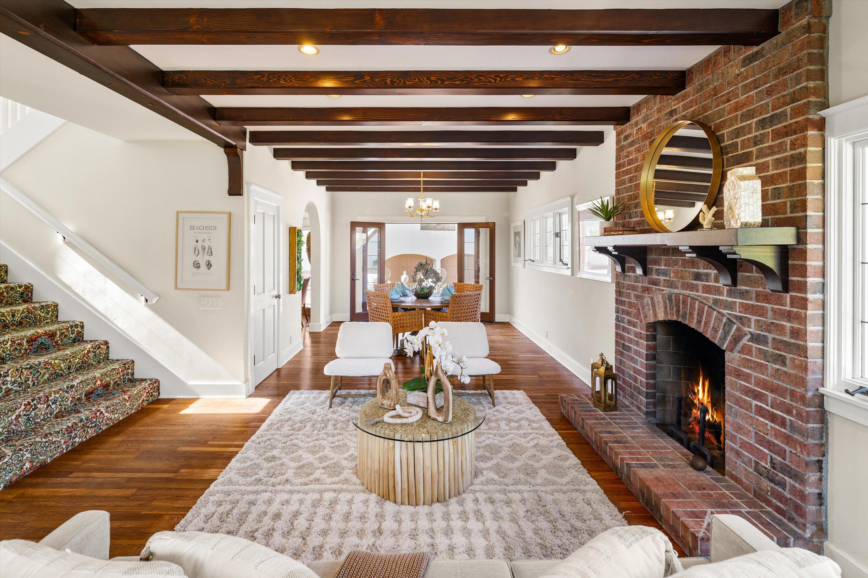 4849 3rd Street Carpinteria, CA 93013 - Photo 12 of 48 a living room with furniture and a fireplace