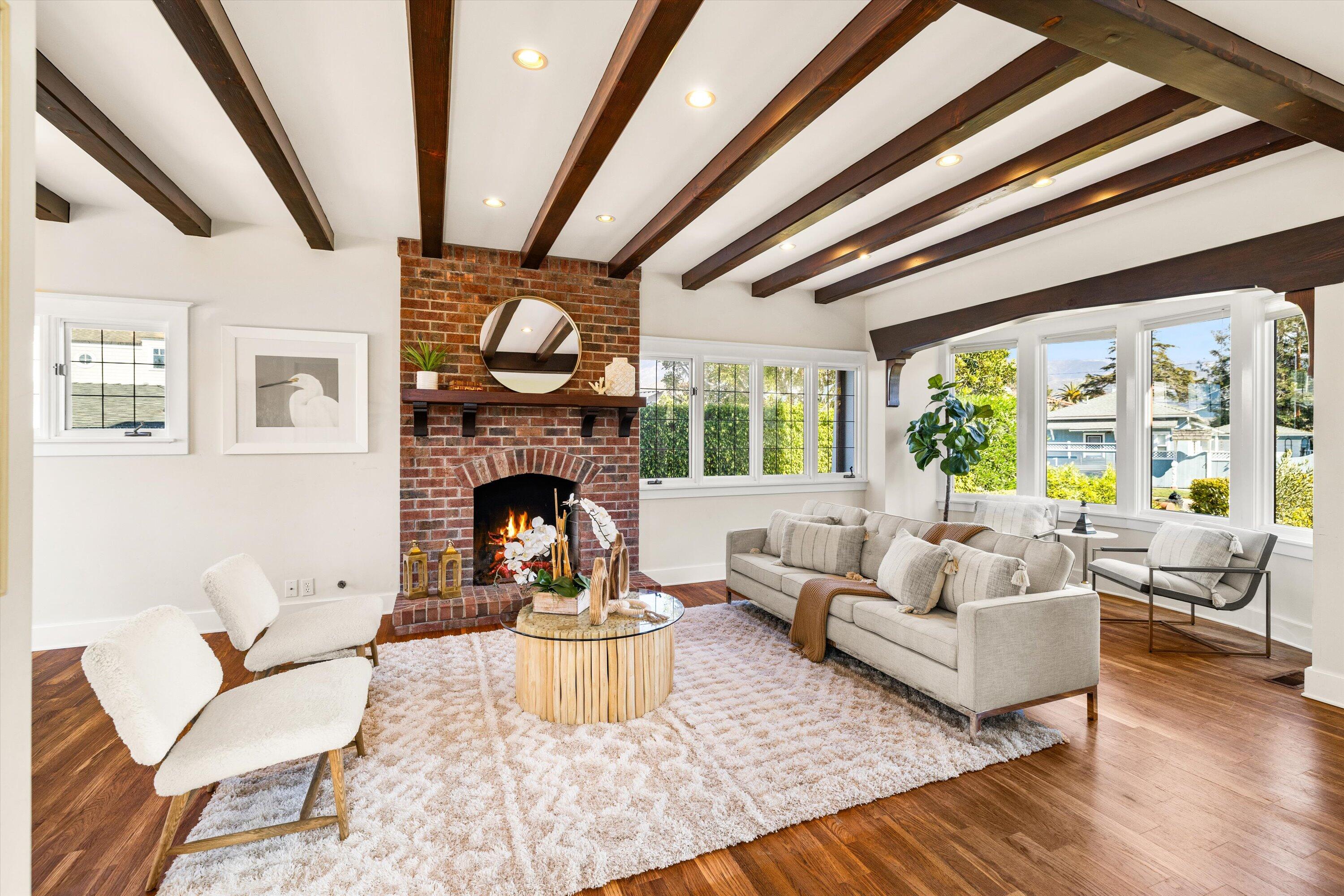 4849 3rd Street Carpinteria, CA 93013 - Photo 13 of 48 a living room with furniture and a fireplace
