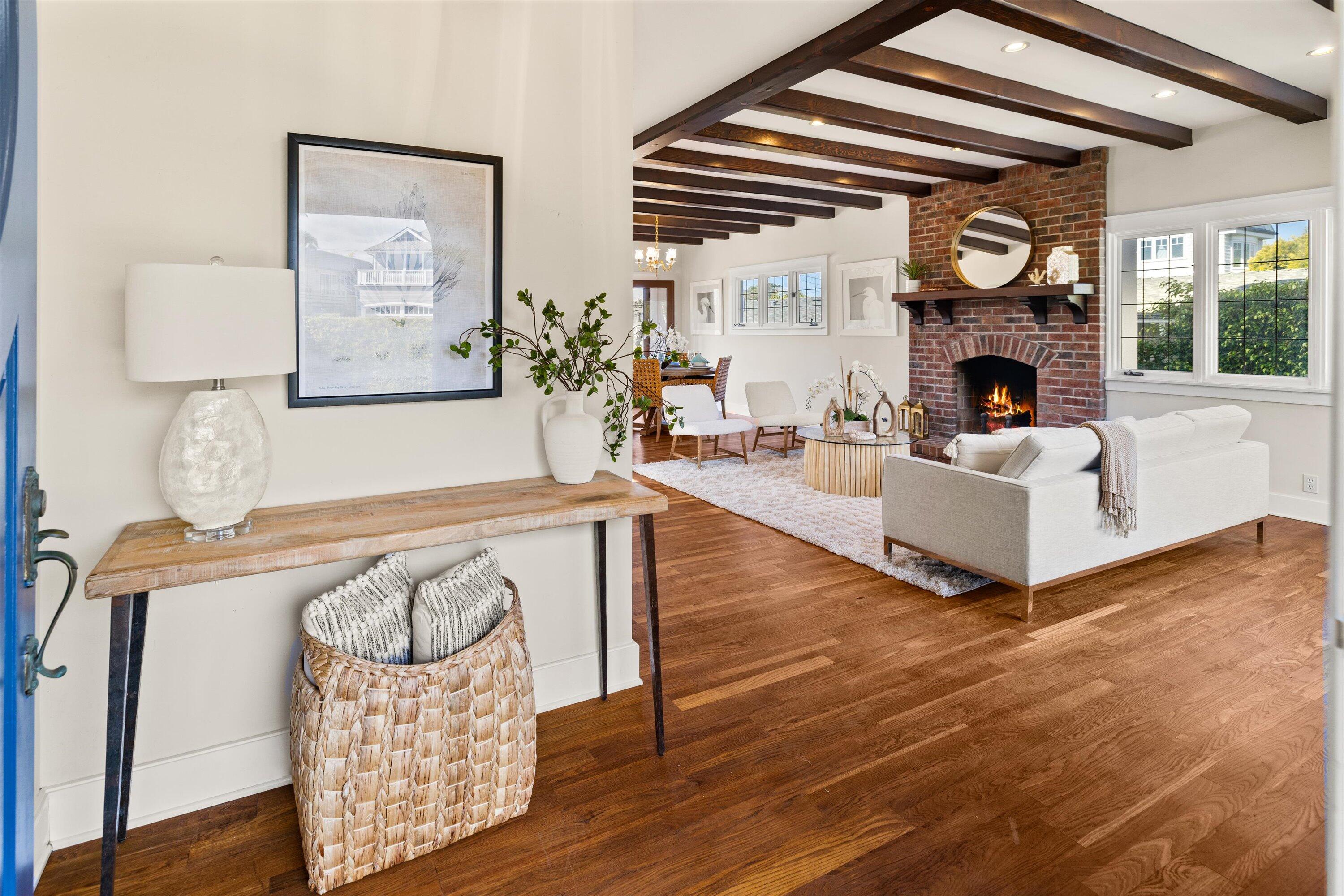 4849 3rd Street Carpinteria, CA 93013 - Photo 15 of 48 a living room with furniture and a fireplace