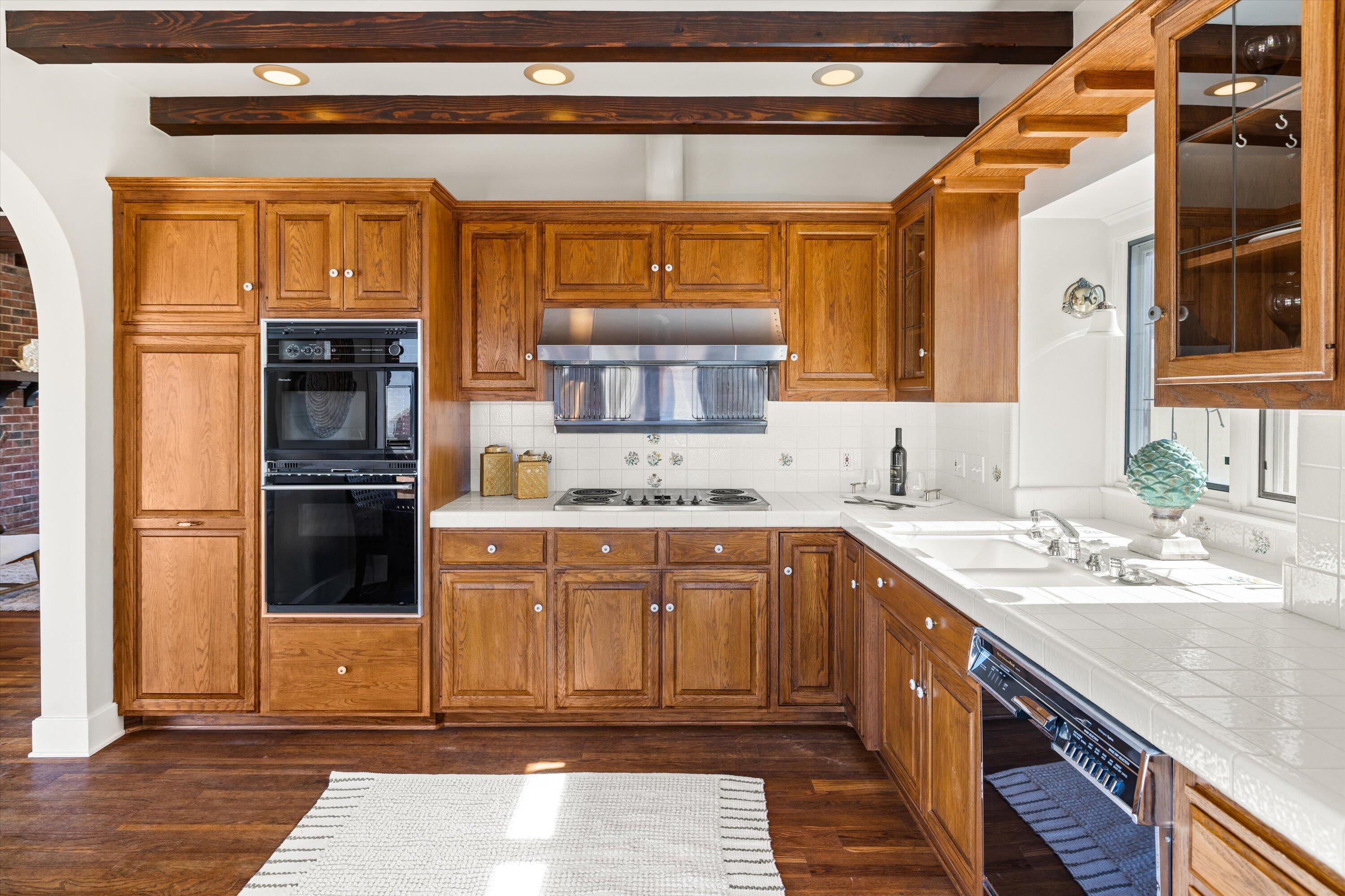 4849 3rd Street Carpinteria, CA 93013 - Photo 18 of 48 a kitchen with a sink and cabinets