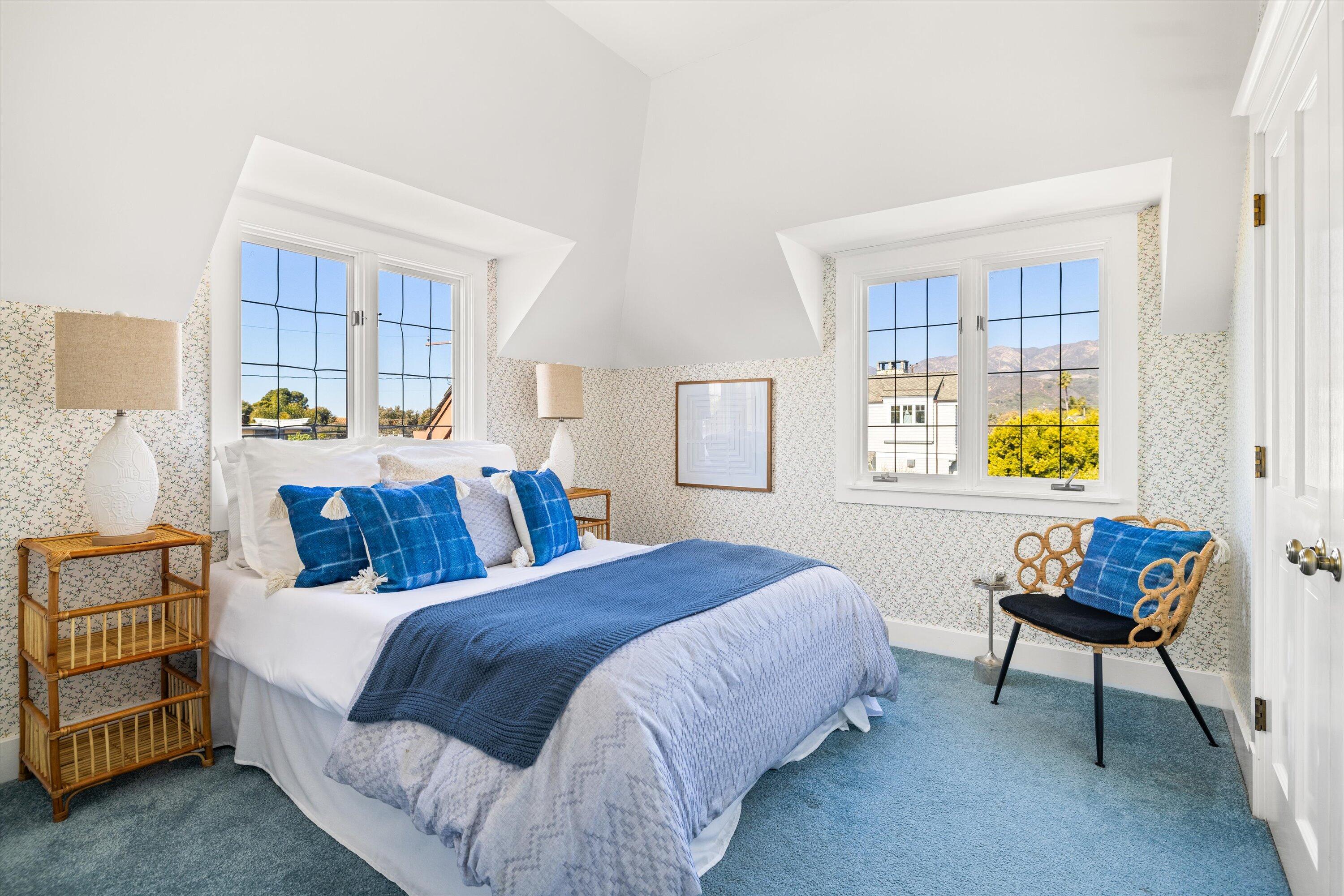 4849 3rd Street Carpinteria, CA 93013 - Photo 23 of 48 a bedroom with a bed and a window