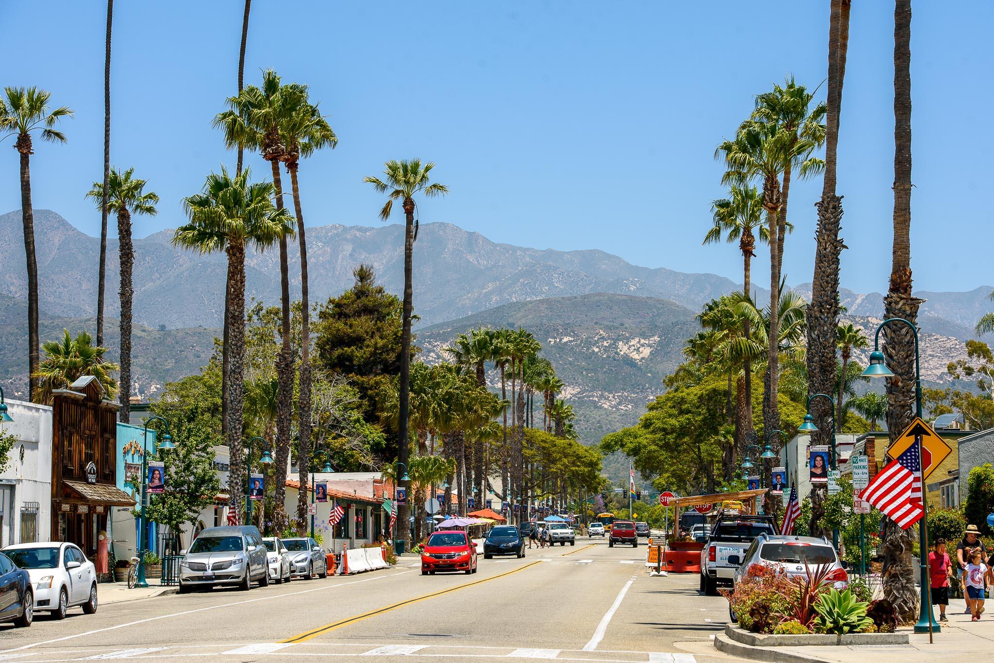 4849 3rd Street Carpinteria, CA 93013 - Photo 37 of 48 a city street with cars parked on the roadside