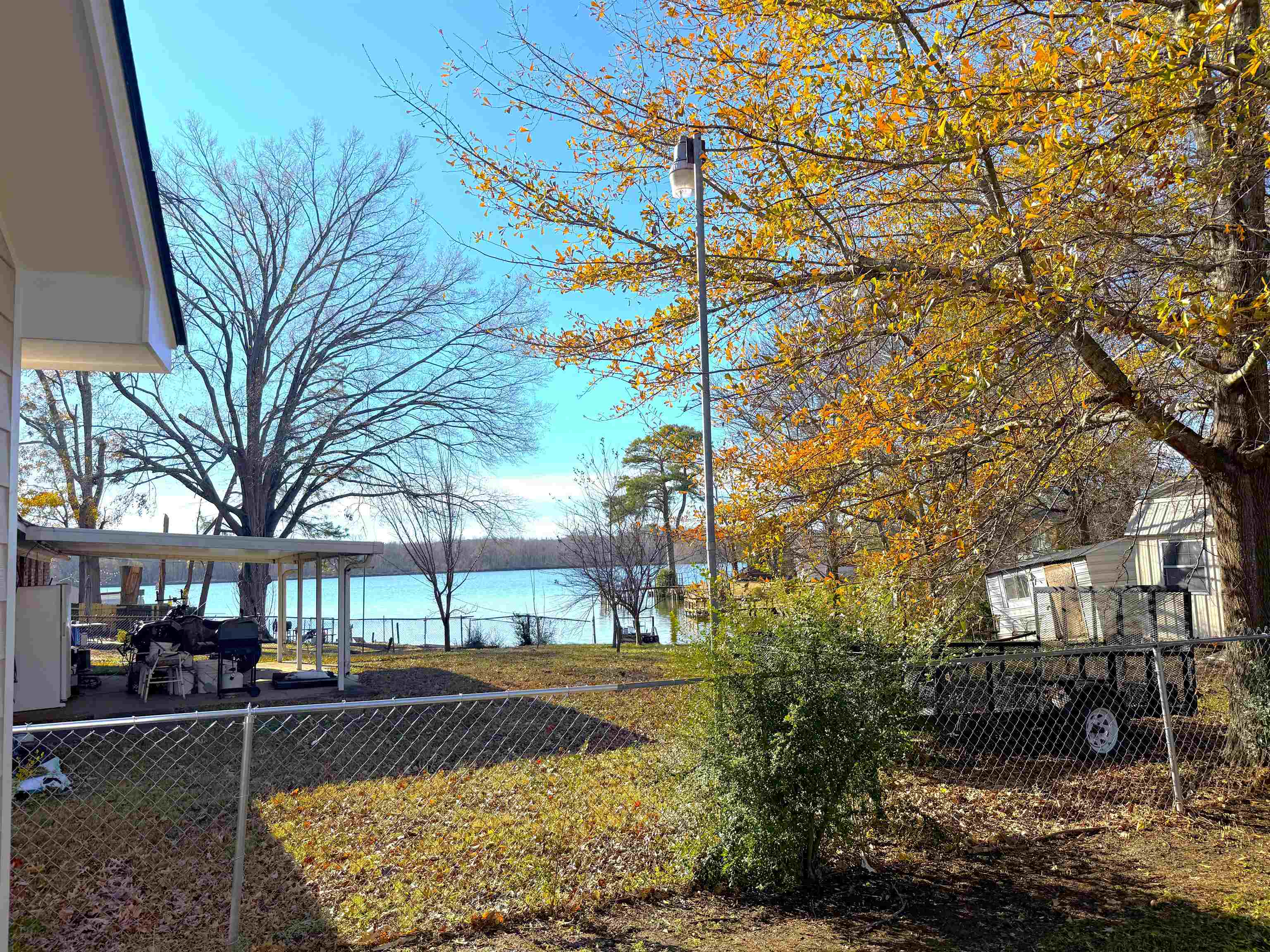 5165 Sea Shore Road Memphis, TN 38109 - Photo 19 of 20 View of yard with a deck with water view