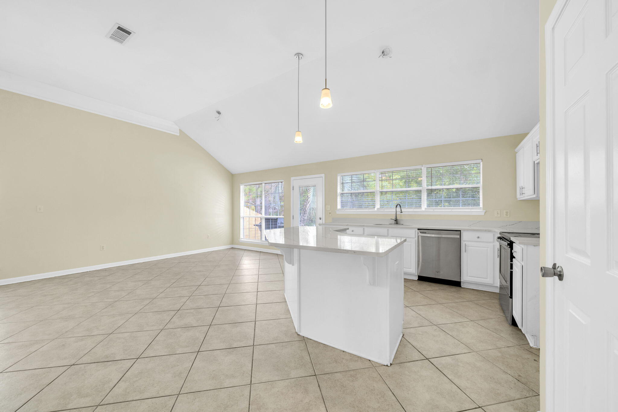 59 Hidden Lakes Drive Destin, FL 32550 - Photo 19 of 39 a kitchen with a sink a counter top space and appliances