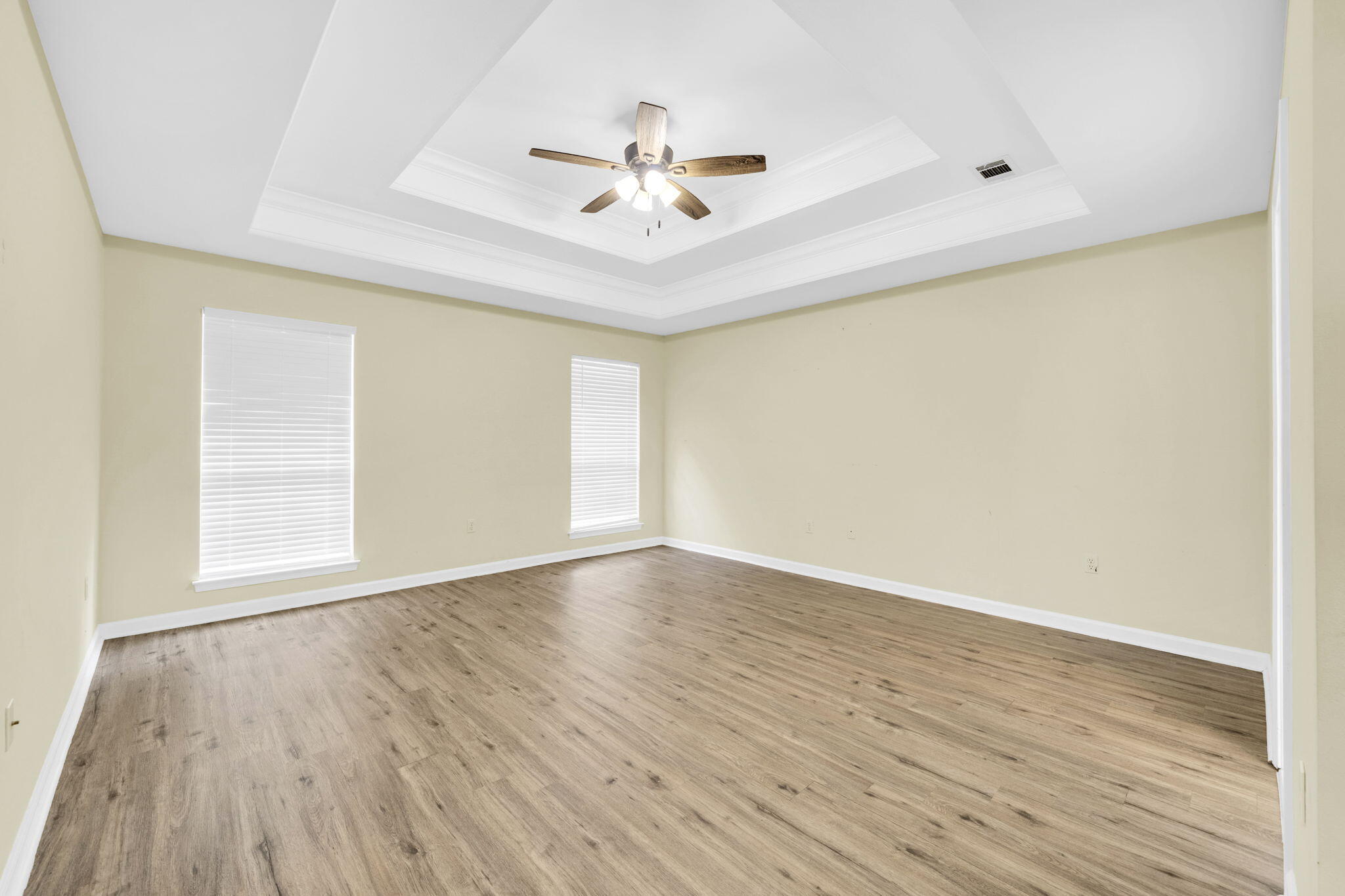 59 Hidden Lakes Drive Destin, FL 32550 - Photo 27 of 39 a view of an empty room with wooden floor and a window