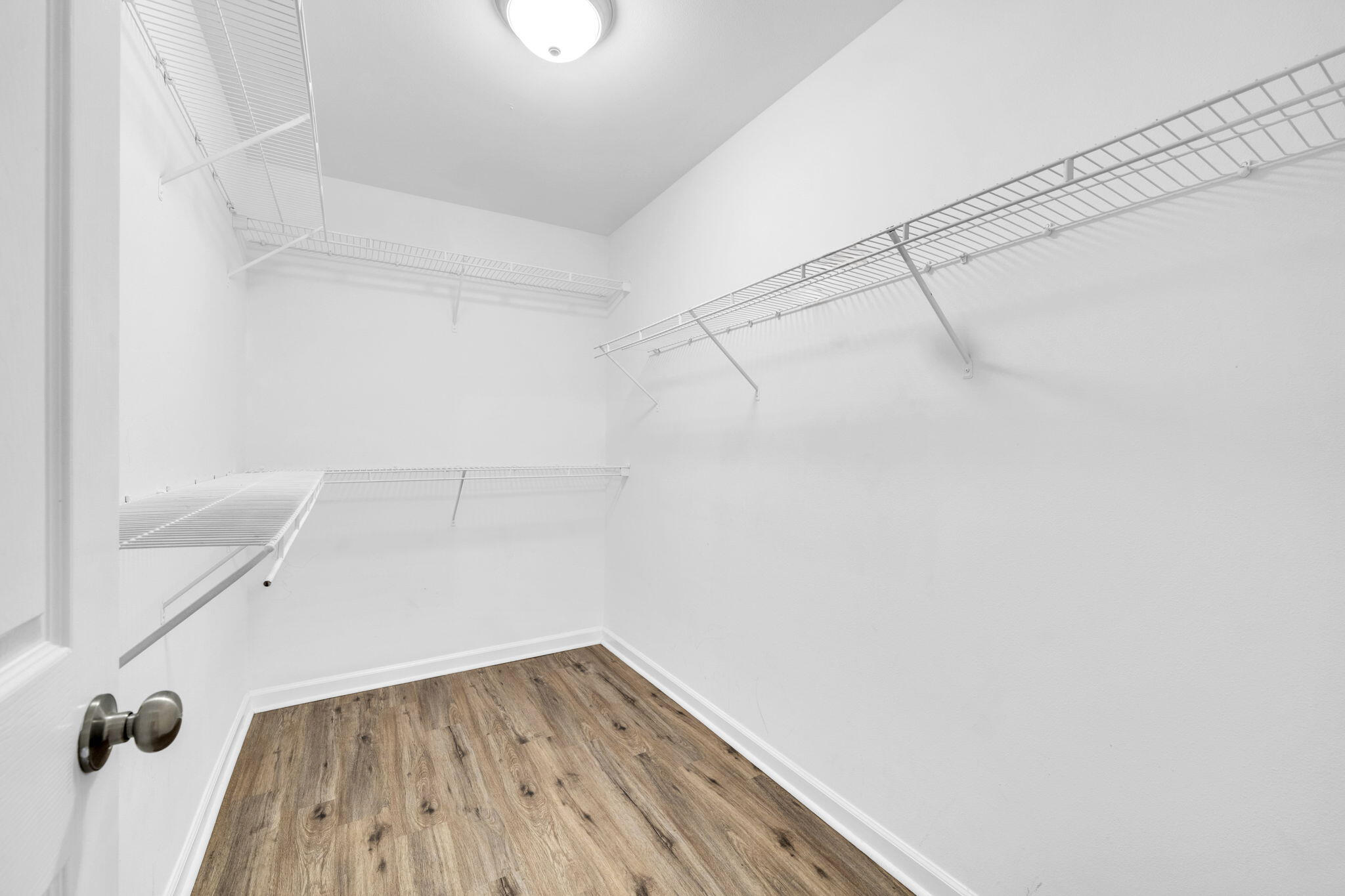 59 Hidden Lakes Drive Destin, FL 32550 - Photo 32 of 39 a view of a room with wooden floor