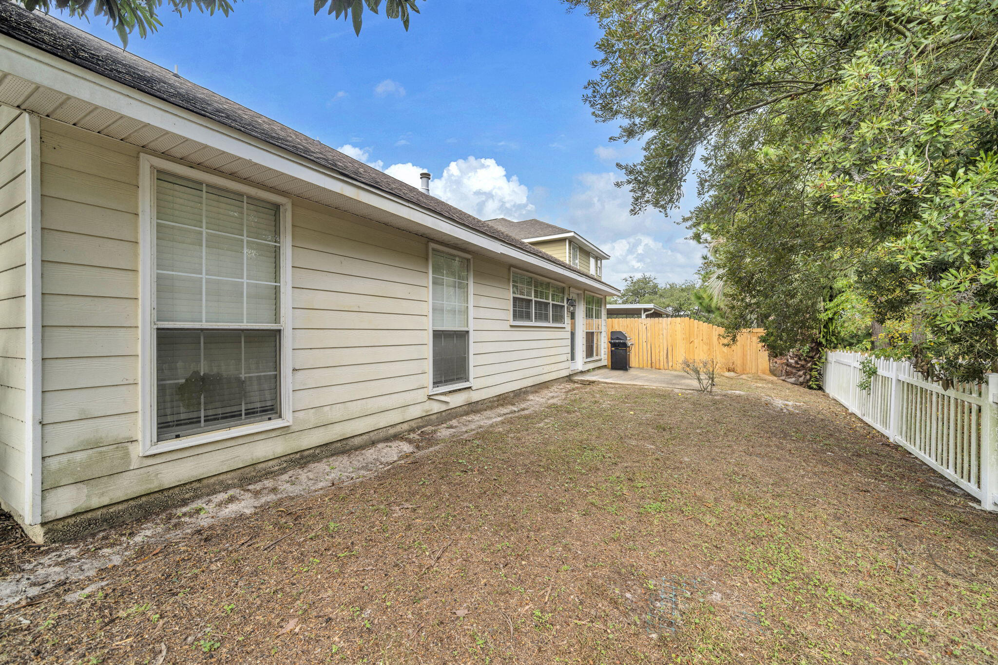 59 Hidden Lakes Drive Destin, FL 32550 - Photo 39 of 39 a view of a house with a yard and garage