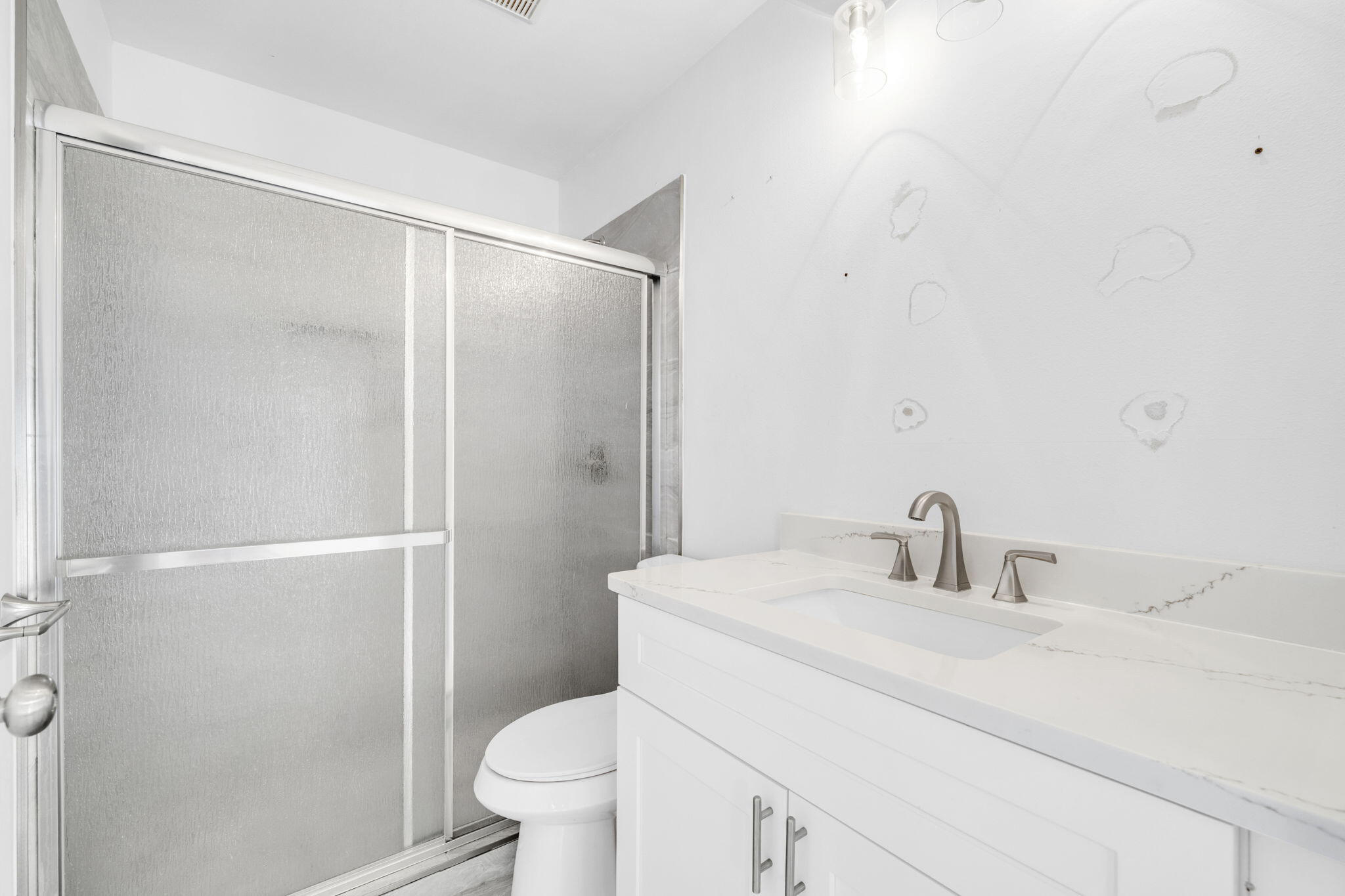 59 Hidden Lakes Drive Destin, FL 32550 - Photo 6 of 39 a bathroom with a sink toilet and shower