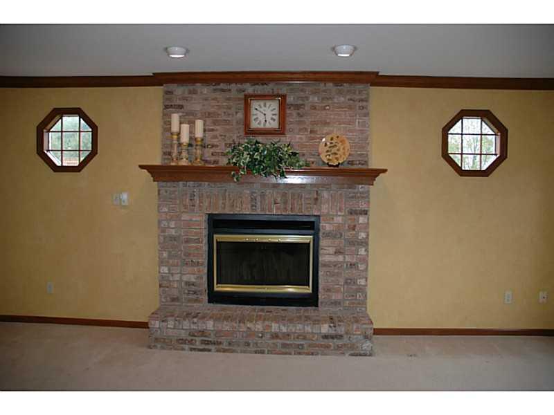 140 Weybridge Road Gibsonia, PA 15044 - Photo 5 of 21 Family Room. Windows in this home are encased in elegant wood.