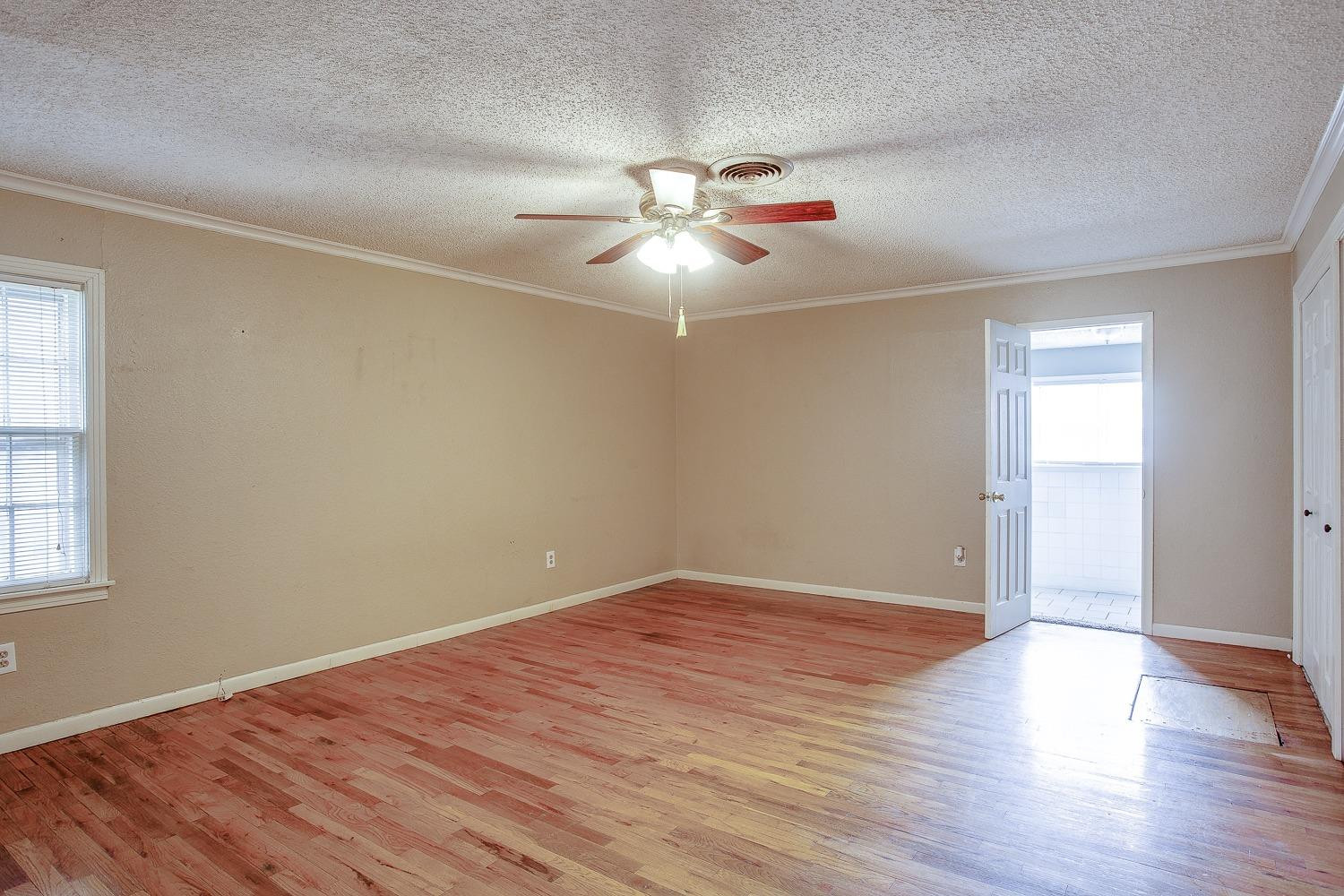 2818 40th Street Lubbock, TX 79413 - Photo 7 of 16 Large Main Bedroom