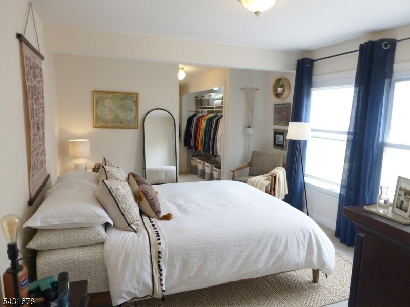 48 Vail Road Landing, NJ 07850 - Photo 14 of 23 a bedroom with bed and a window