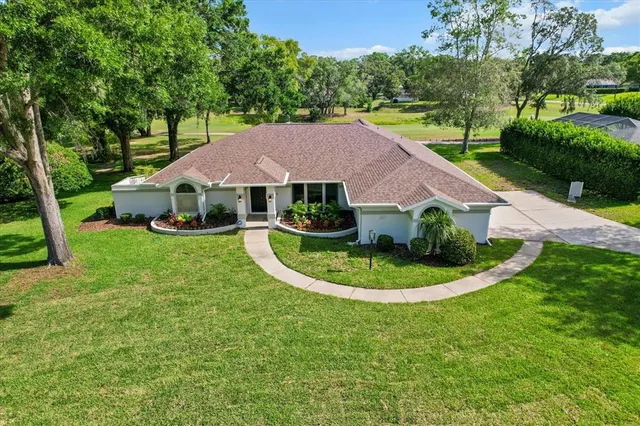 a view of house with garden space and street view