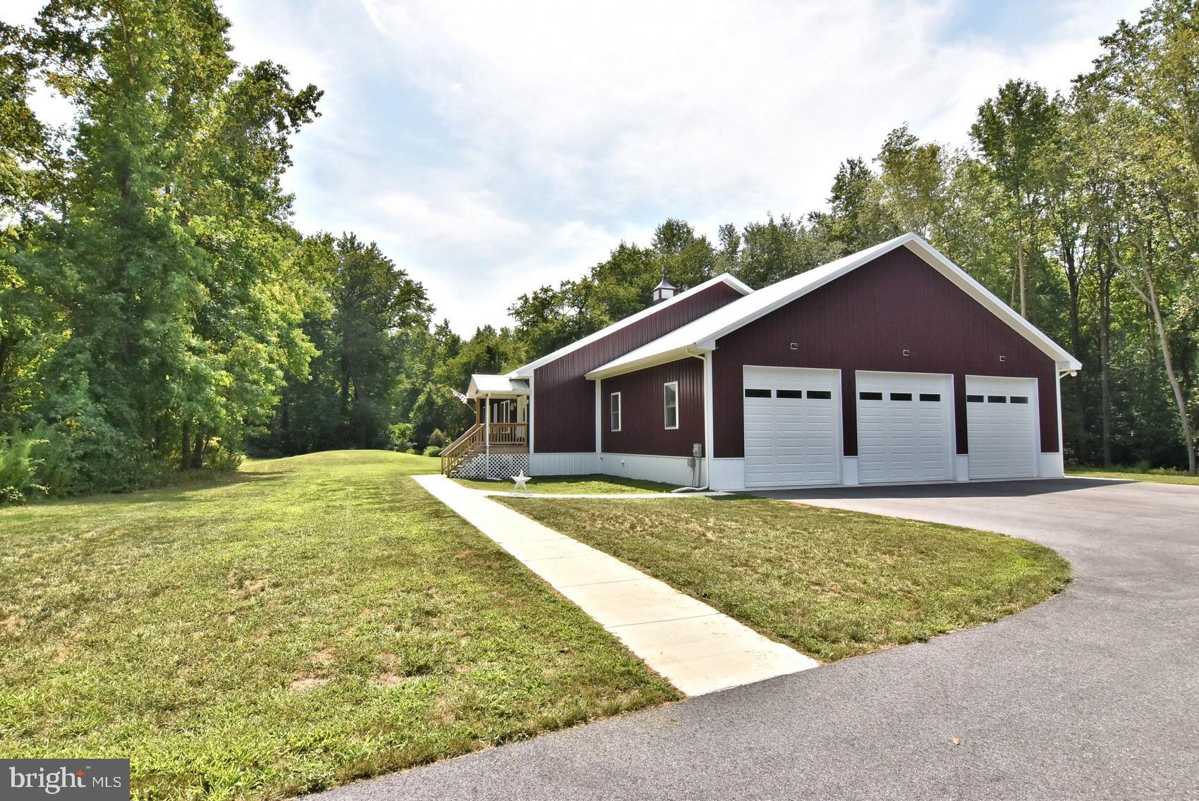 26980 Gov Stockley Road Georgetown, DE 19947 - Photo 5 of 36 12 ft. high garage doors