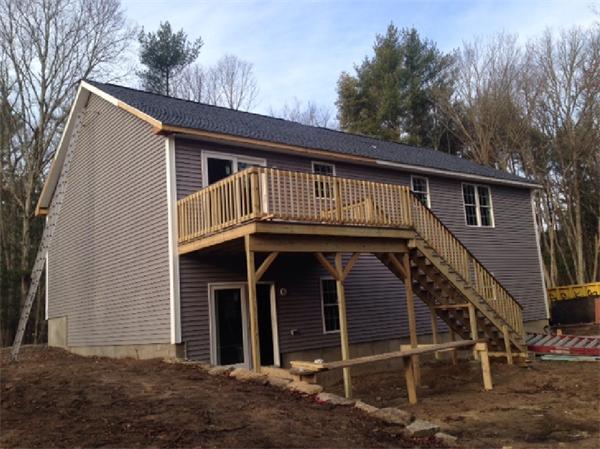 280 Hathaway Road Acushnet, MA 02743 - Photo 3 of 26 a front view of a house with a yard