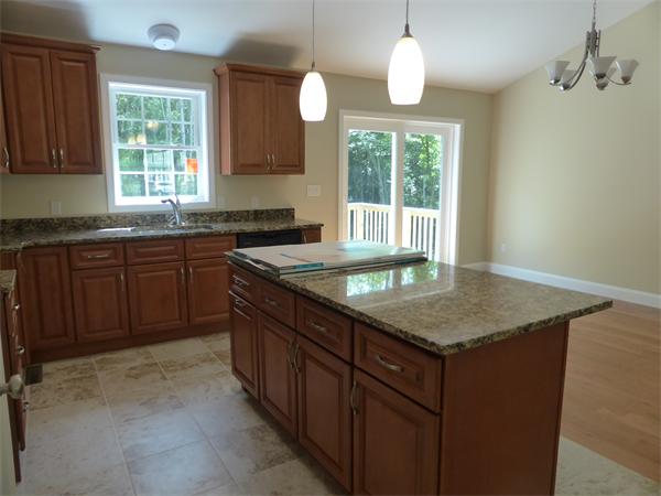 280 Hathaway Road Acushnet, MA 02743 - Photo 8 of 26 a kitchen with a sink a window and cabinets