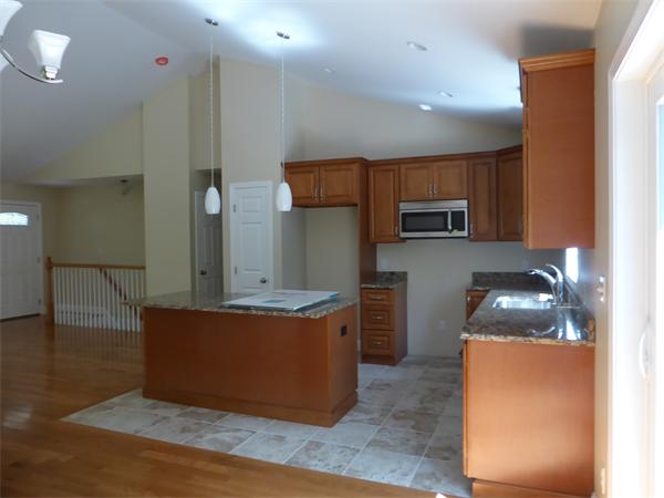 280 Hathaway Road Acushnet, MA 02743 - Photo 9 of 26 a kitchen with stainless steel appliances granite countertop a sink and a stove top oven
