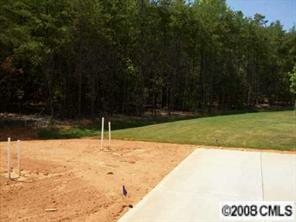 1428 Secret Path Drive, Unit 212 Fort Mill, SC 29708 - Photo 6 of 7 a backyard of a house