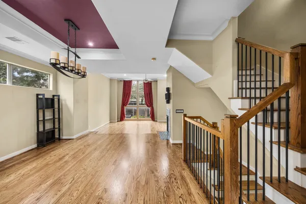 a view of a livingroom with a furniture and wooden floor