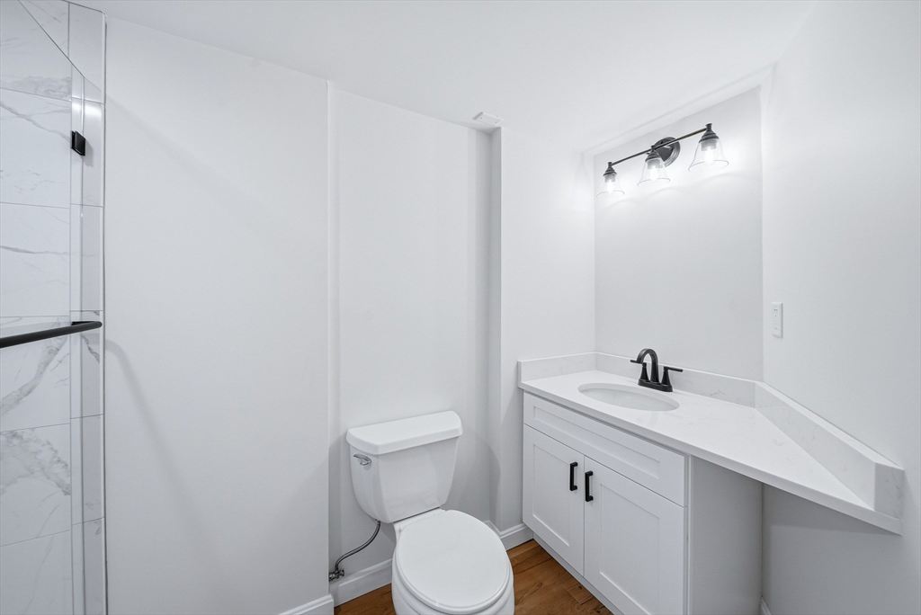 1 Ayrshire Road Worcester, MA 01604 - Photo 22 of 41 a bathroom with a toilet sink and mirror