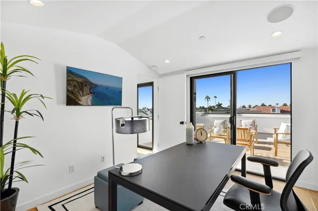 a workspace with furniture and a window