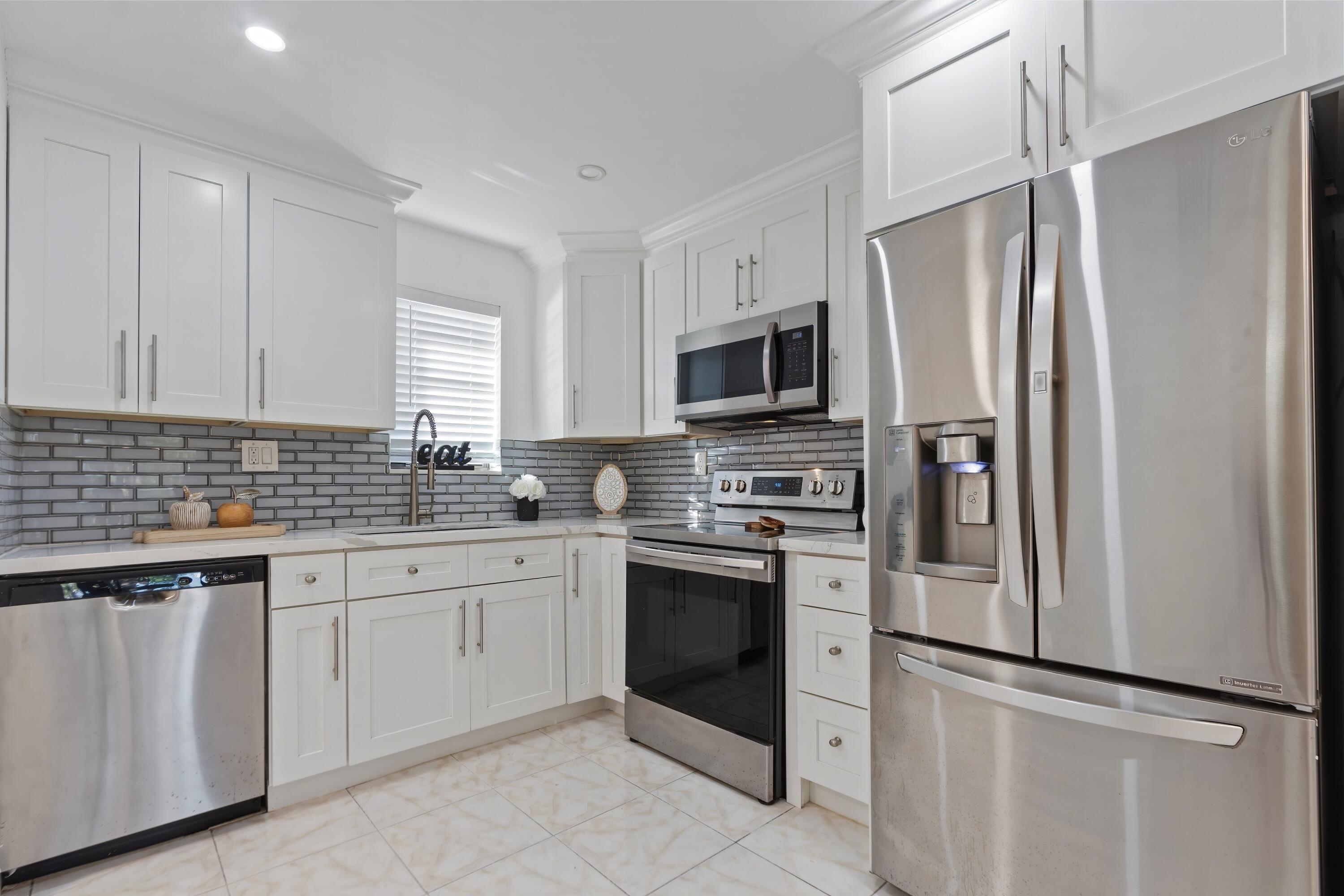 9370 Southwest 8th Street, Unit 208 Boca Raton, FL 33428 - Photo 2 of 24 Beautiful New Kitchen