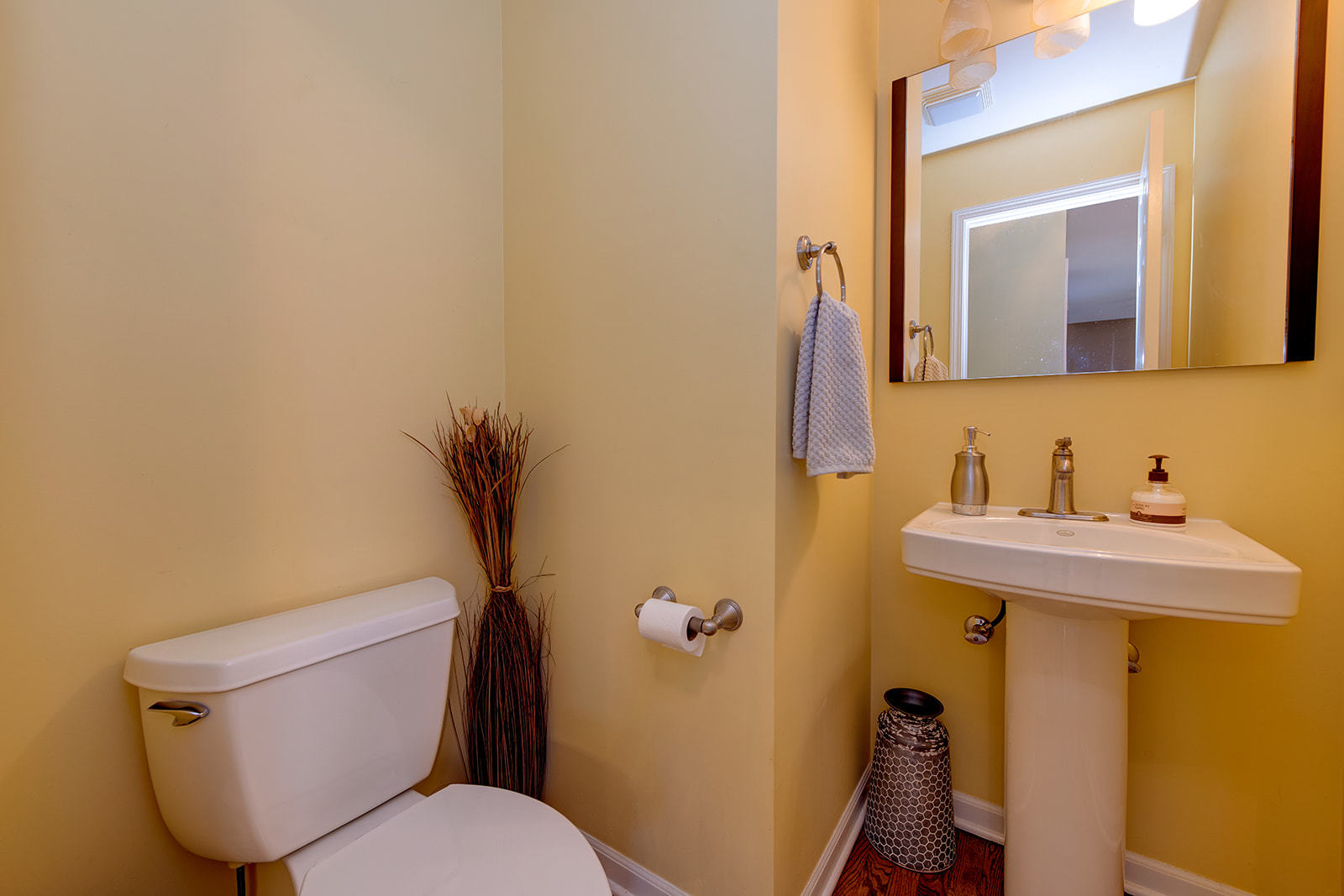 866 Deer Path Drive Antioch, IL 60002 - Photo 11 of 28 a bathroom with a toilet a sink and mirror