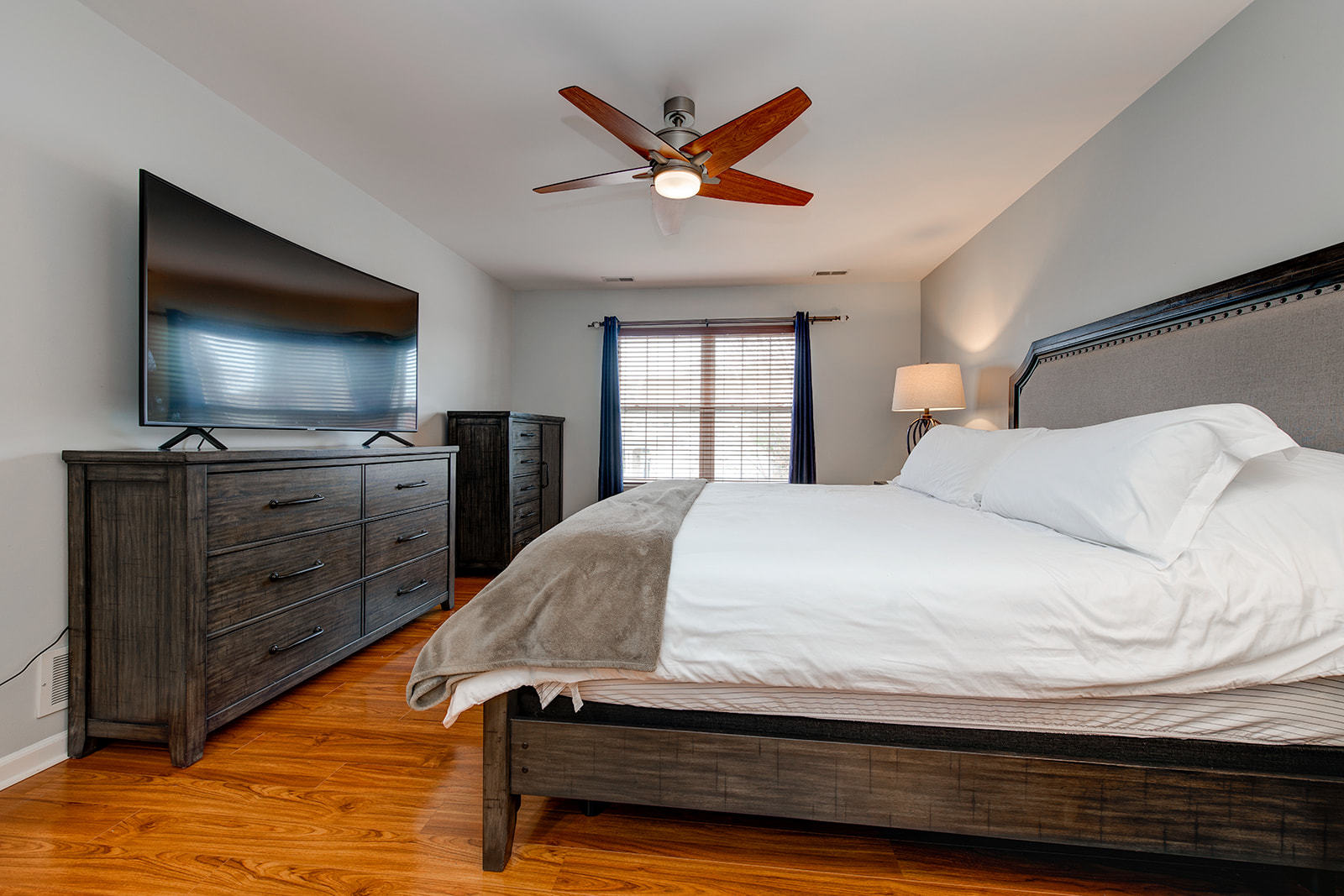 866 Deer Path Drive Antioch, IL 60002 - Photo 17 of 28 a bedroom with a bed and a flat screen tv